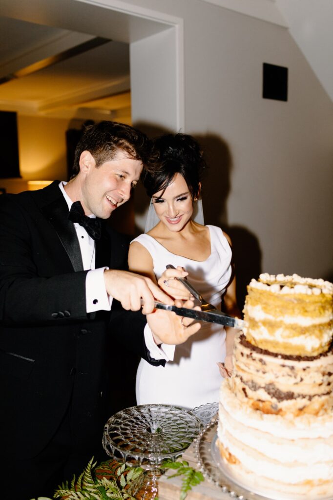 Bride and Groom cutting the wedding cake