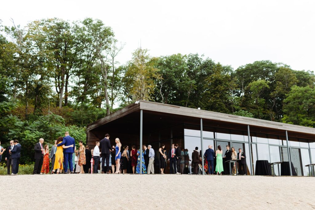Guests outside the main building at Rosewood Beach in Highland Park prior to the wedding