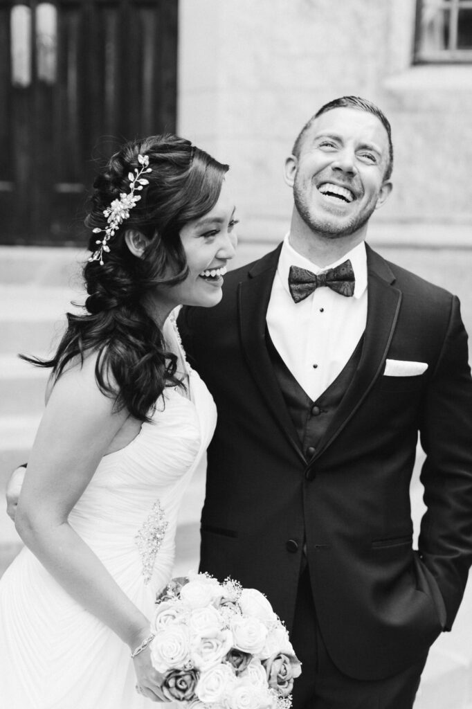 Bride and Groom candidly laughing