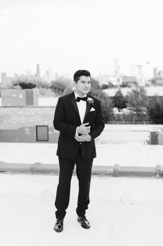 Photo of Groom alone on the roof top at the Walden