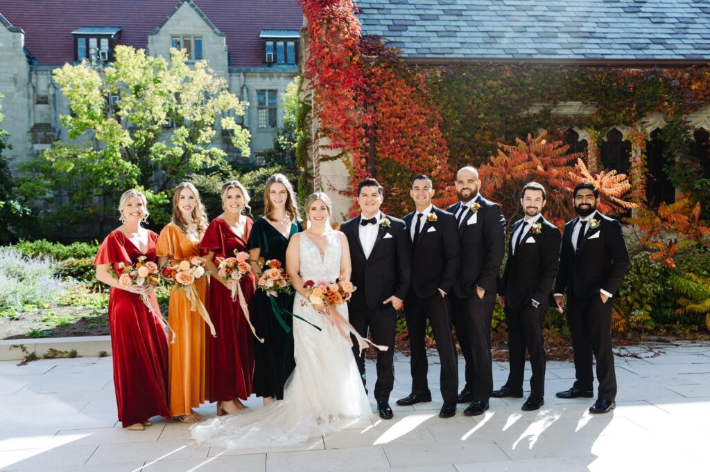 Bridal party in a line in front of the Walden