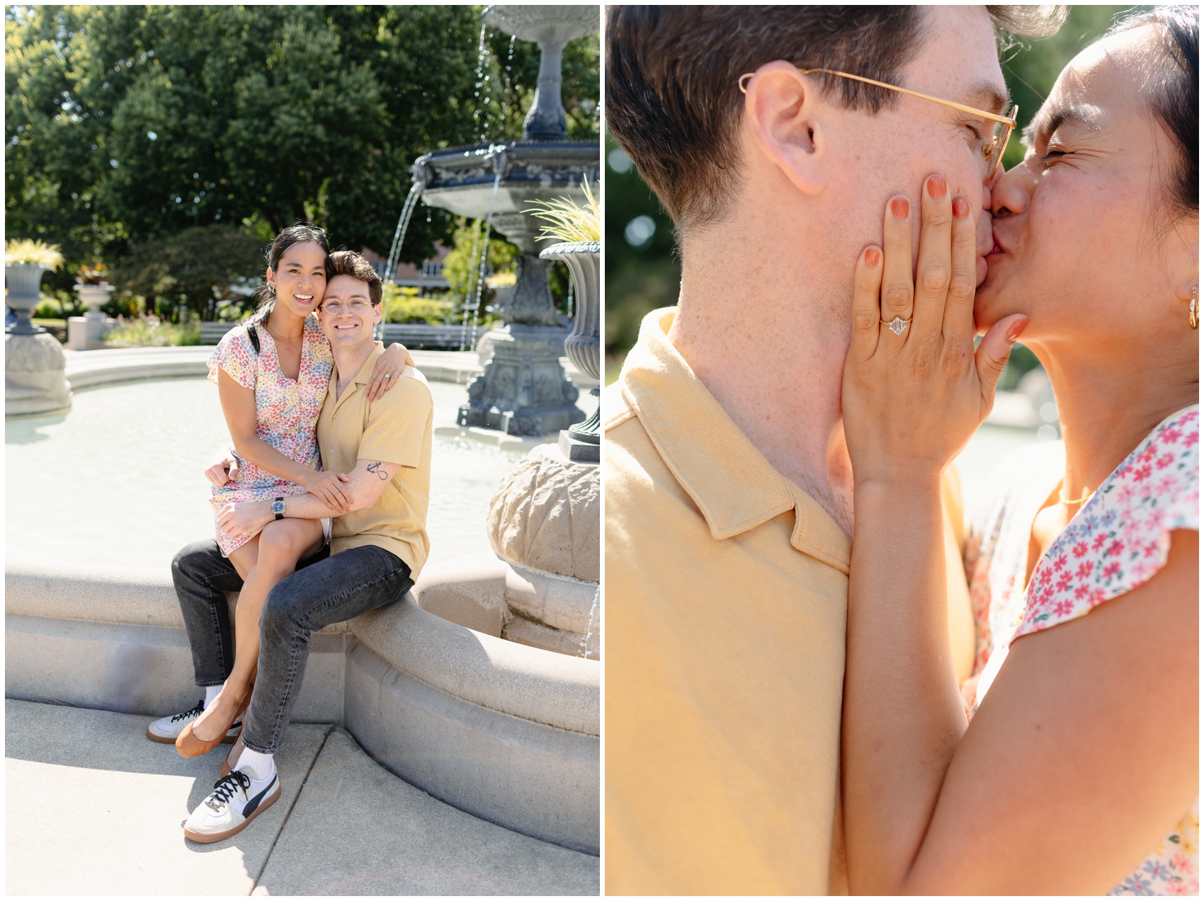 A happy couple kisses and sits on a fountain edge while showing off the engagement ring