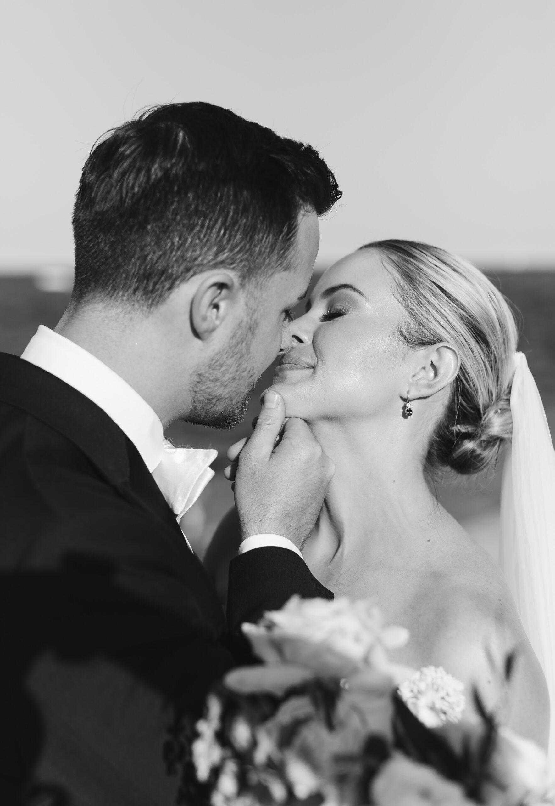 A groom kisses bride 
